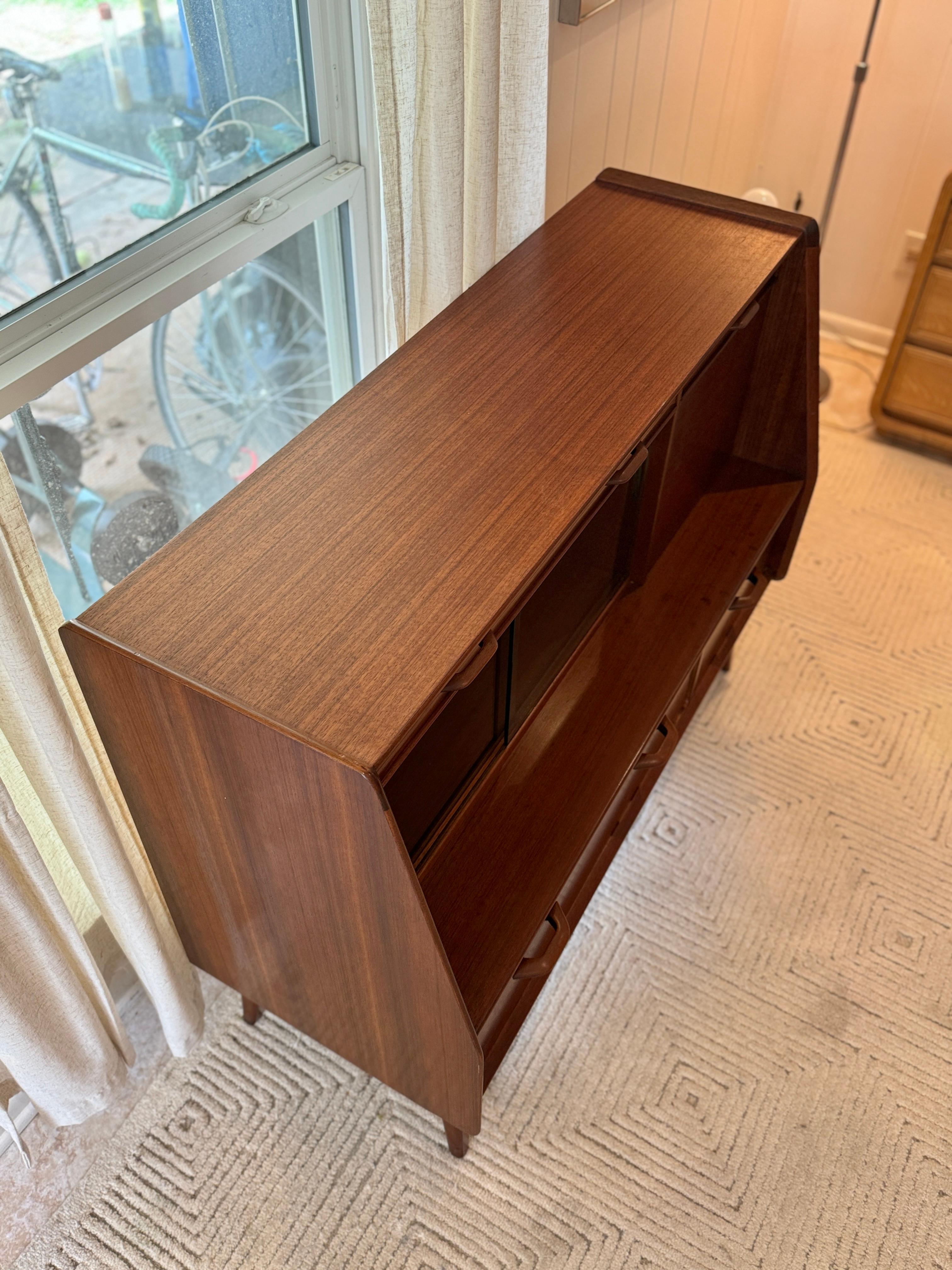 A mid century modern E. Gomme G Plan sideboard/bar cabinet circa 1960s 1