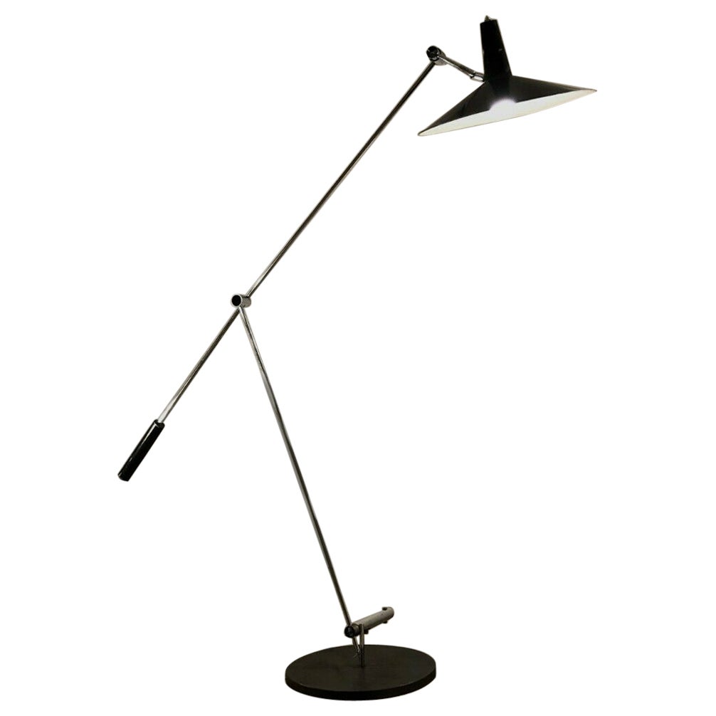 A MID-CENTURY-MODERN FLOOR LAMP by RICO 
ROSEMARIE BALTENSWEILER, Swiss 1950
