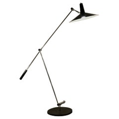 A MID-CENTURY-MODERN FLOOR LAMP by RICO 
ROSEMARIE BALTENSWEILER, Swiss 1950