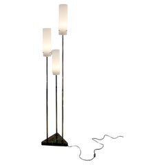 A MID-CENTURY-MODERN FLOOR LAMP in the style of TITO AGNOLI & OLUCE, Italy 1950