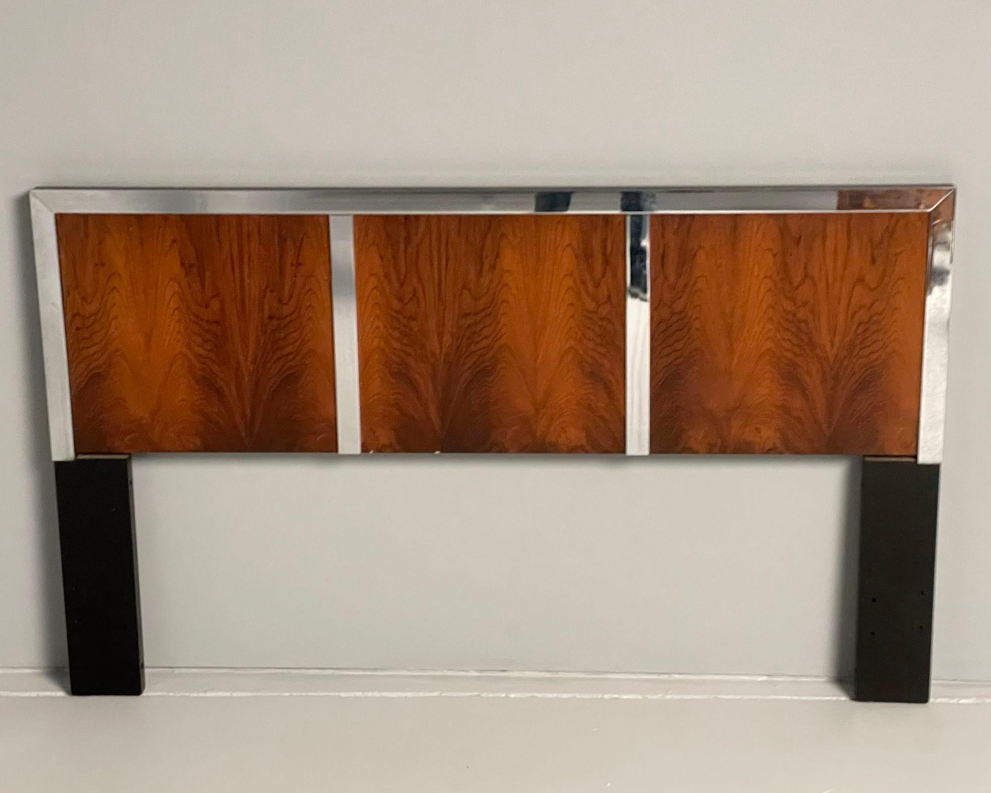 A Mid Century Modern Full Headboard, Milo Baughman, Chrome and Rosewood

Having a tri panel rosewood backsplash framed in a chrome design on ebony legs and sides. Good condition, minor scratches.

36H x 60W x 2D
