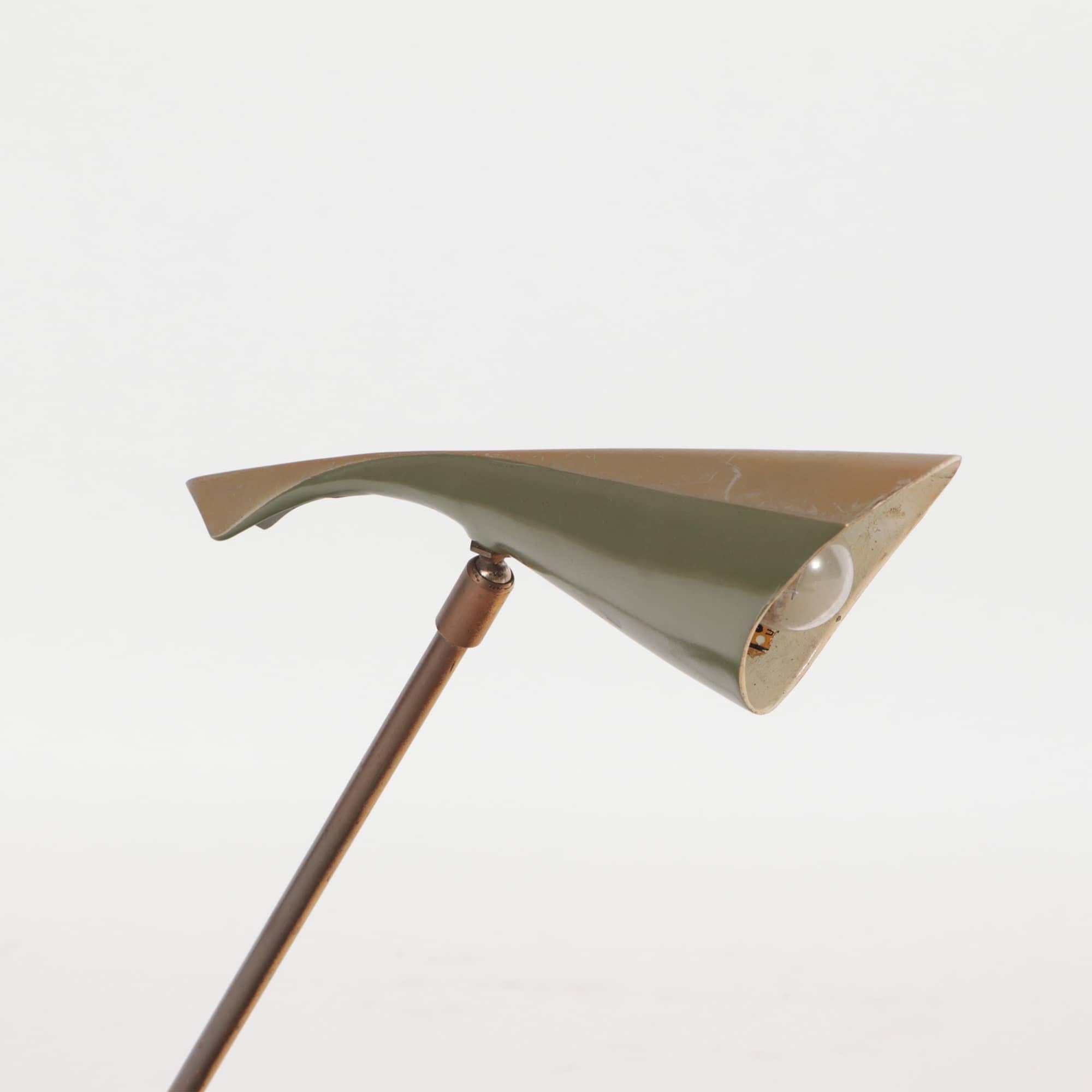 A Mid-Century Modern futuristic olive green enameled metal and brass Laurel desk lamp circa 1950.