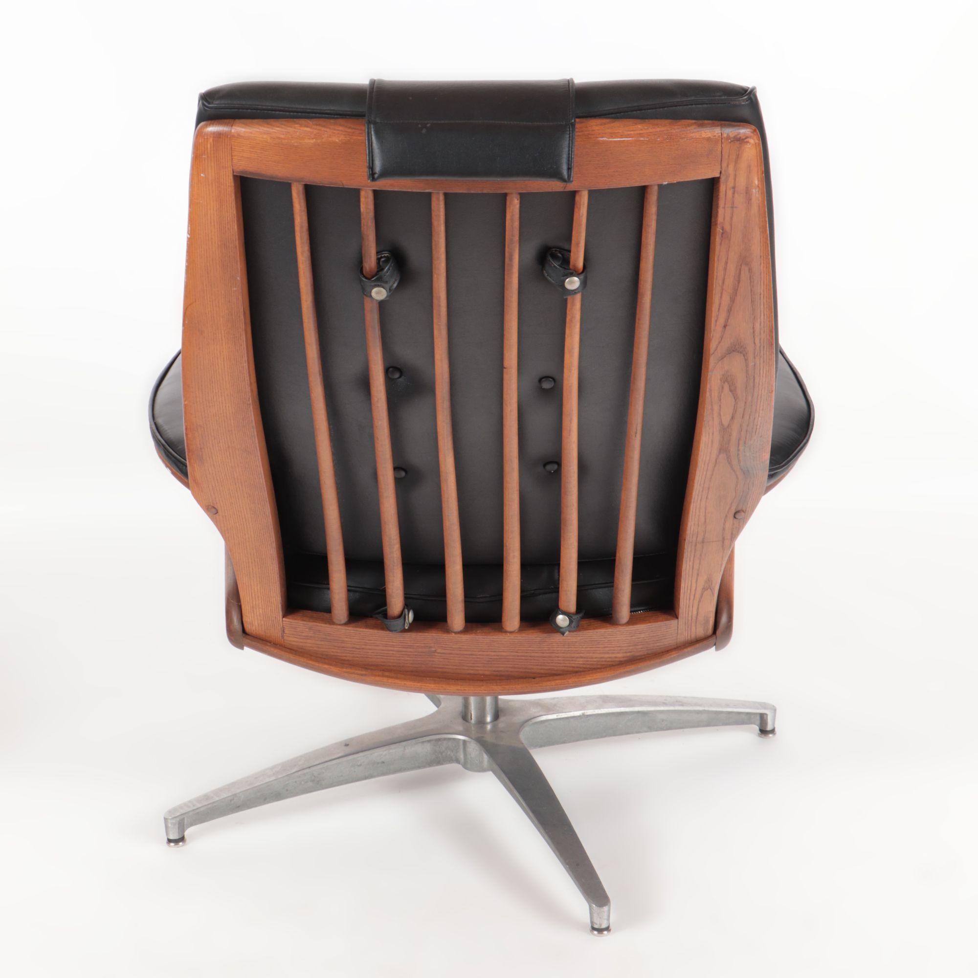 Faux Leather Mid-Century Modern Heywood Wakefield Teak Swivel Lounge Chair, circa 1960