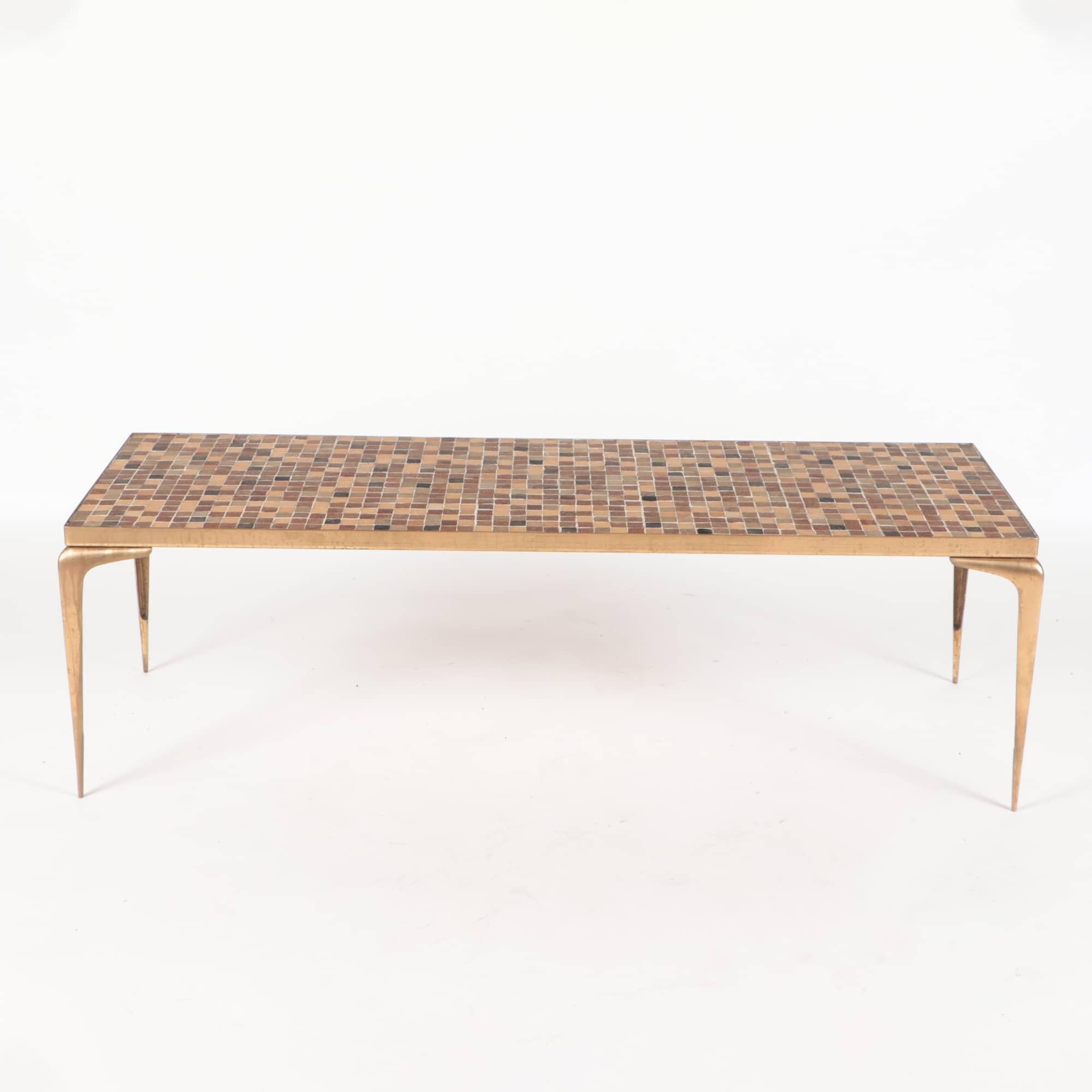 A very stylish Mid-Century Modern Italian coffee table with brass legs and top made of mosaic of neutral toned Italian glass tiles circa 1960.