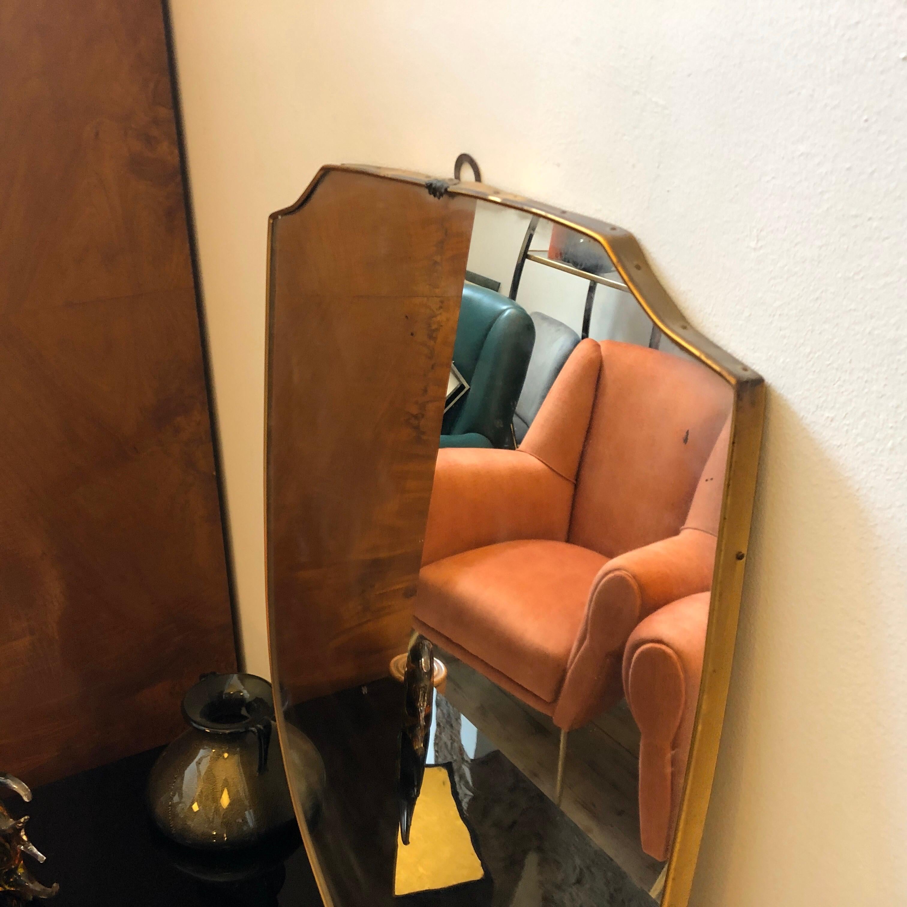 Stylish wall mirror made in Italy in the 1950s, good conditions overall.
