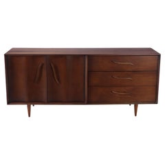 A Mid-Century Modern low boy dresser