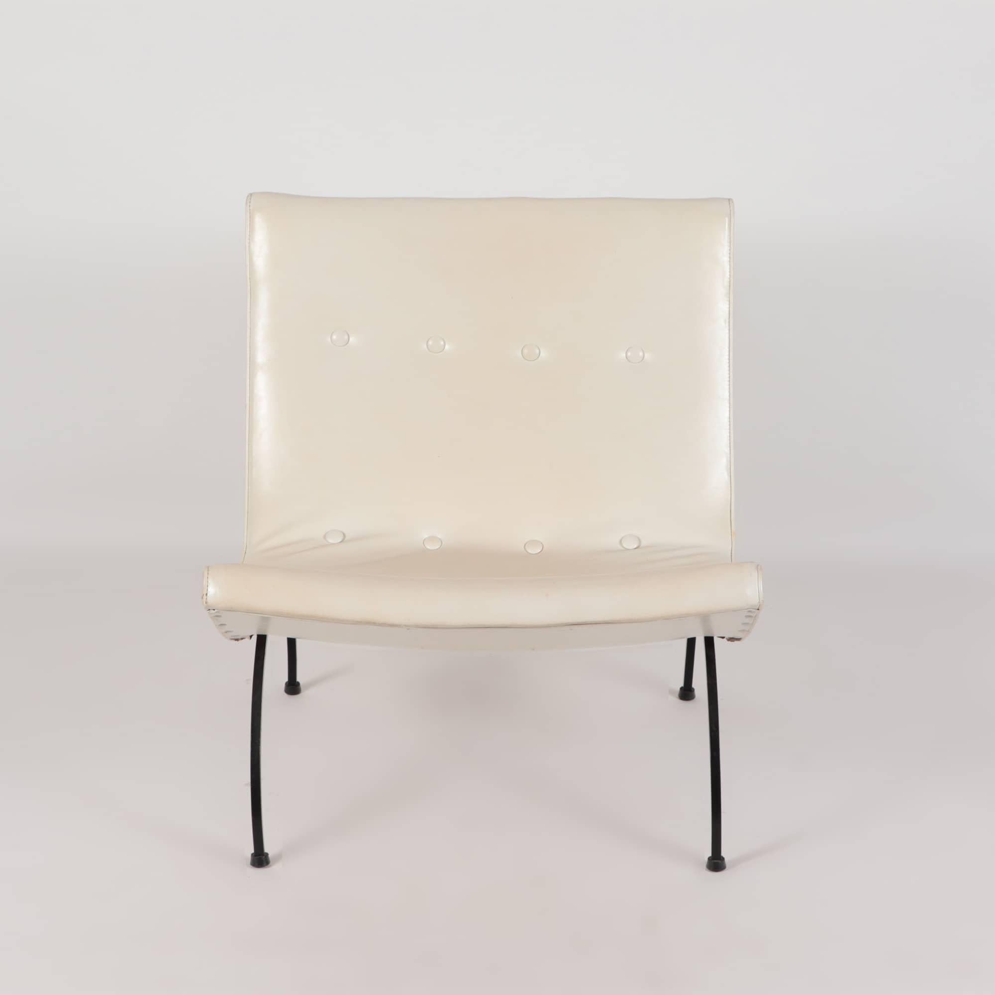 A Mid-Century Modern Milo Baughman white leather Scoop chair. An iconic form having an ergonomic design with arched iron legs 1950.