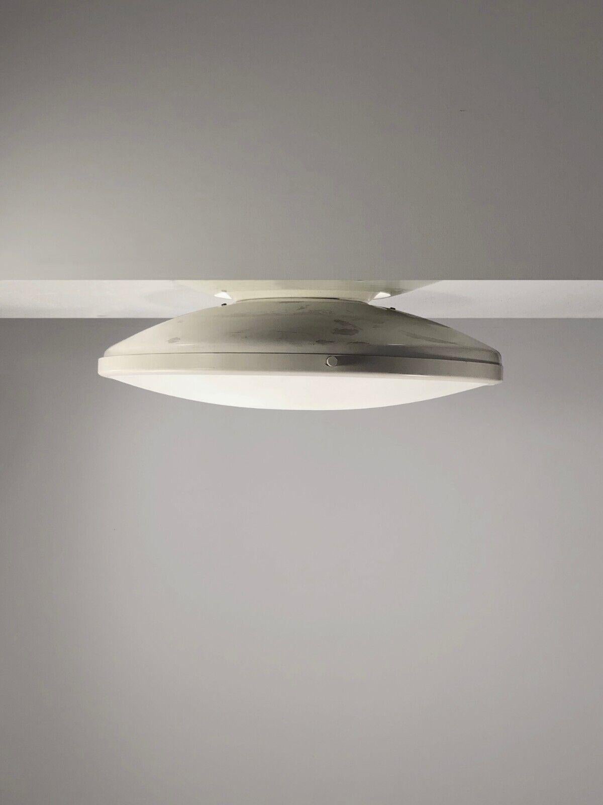 A rare, iconic and authentic circular ceiling light with space inspiration, Modernist, Space-Age, Forme-Libre, ovoid body and frame in off-white lacquered metal screwed by 3 lacquered screws, sandblasted frosten curved glass, by Pierre Paulin,