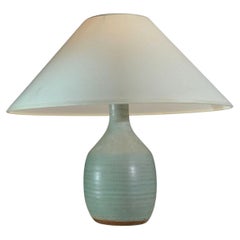 A MID-CENTURY-MODERN NEOCLASSIC Ceramic TABLE LAMP by DRILLON, France 1950