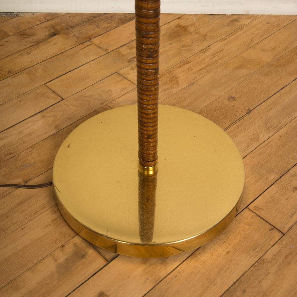 A Mid-Century Modern Transitional vintage wrapped rattan and brass floor lamp. 
 Featured model in Miami's Kips Bay 2021 Showhouse 
 Measures: Base diameter: 10