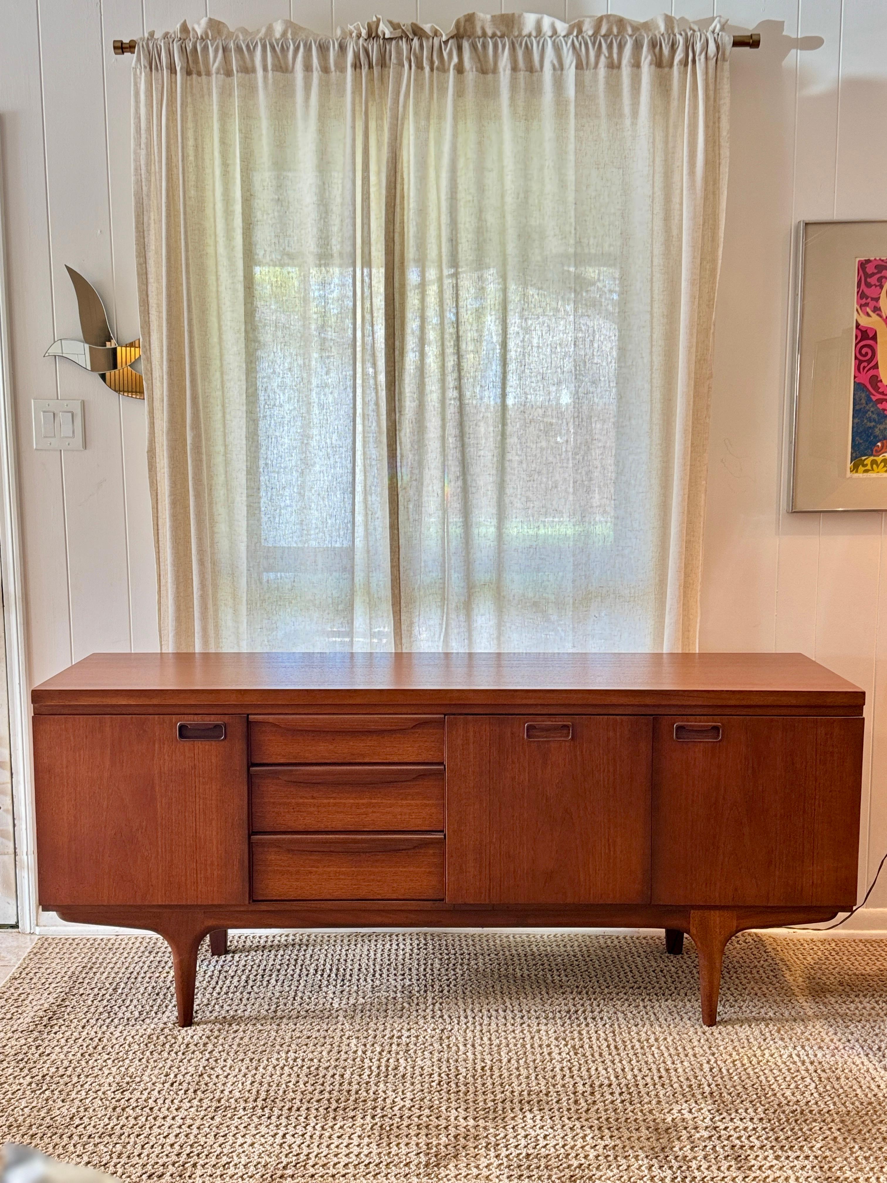 A mid century modern sideboard by British furniture maker Greaves & Thomas 2