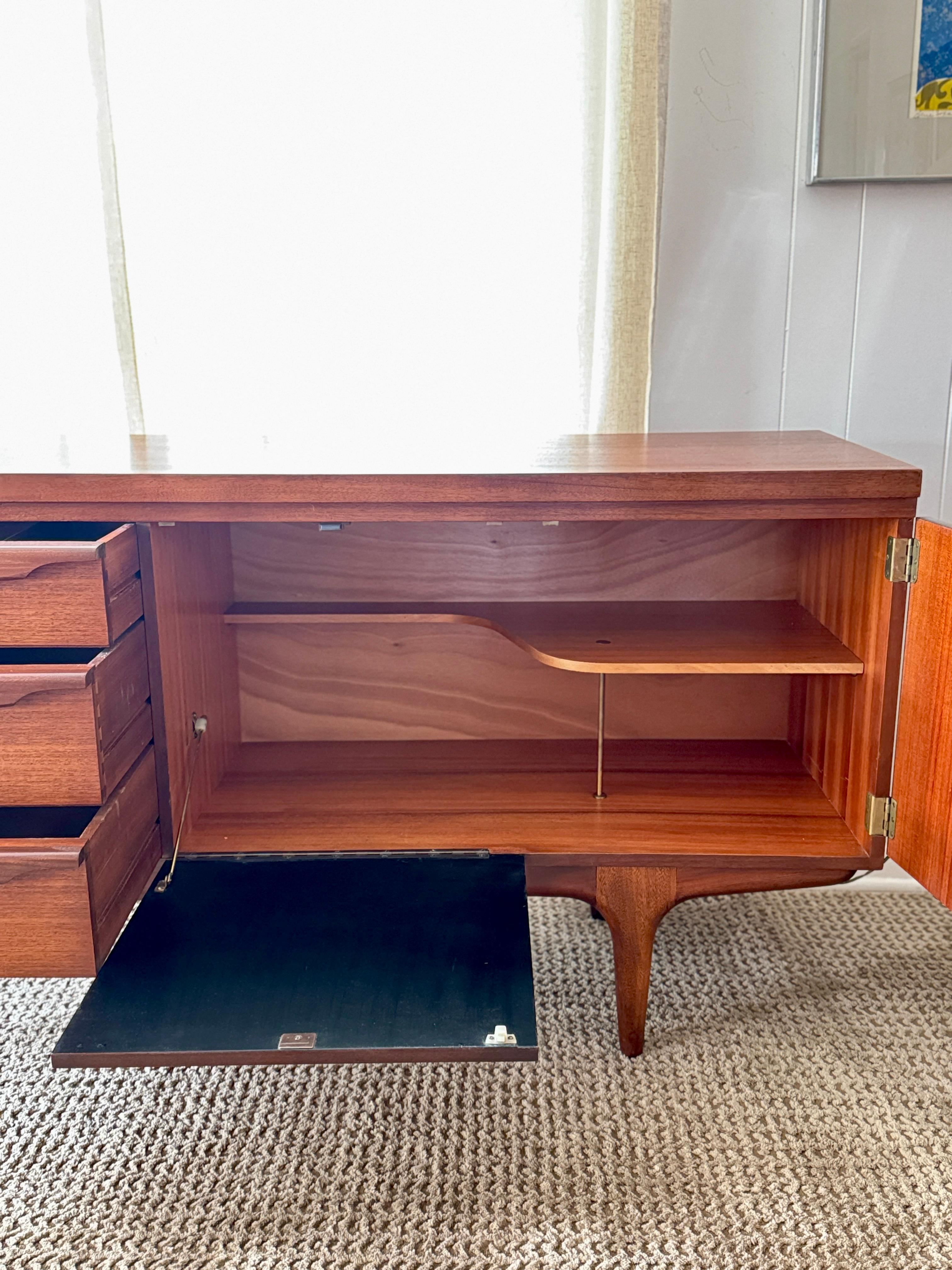 A mid century modern sideboard by British furniture maker Greaves & Thomas 4