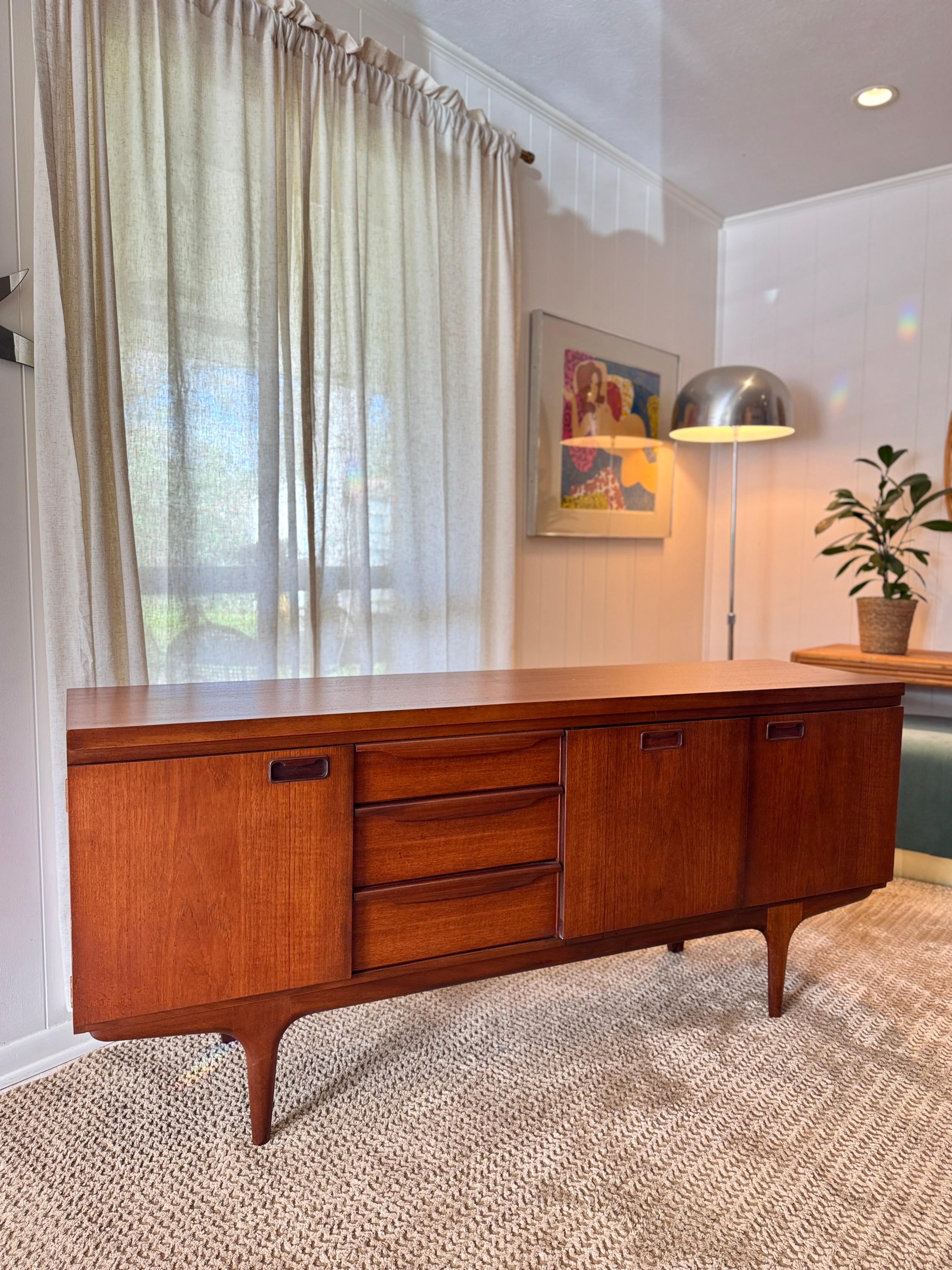 A mid century modern sideboard by British furniture maker Greaves & Thomas In Good Condition In Houston, TX