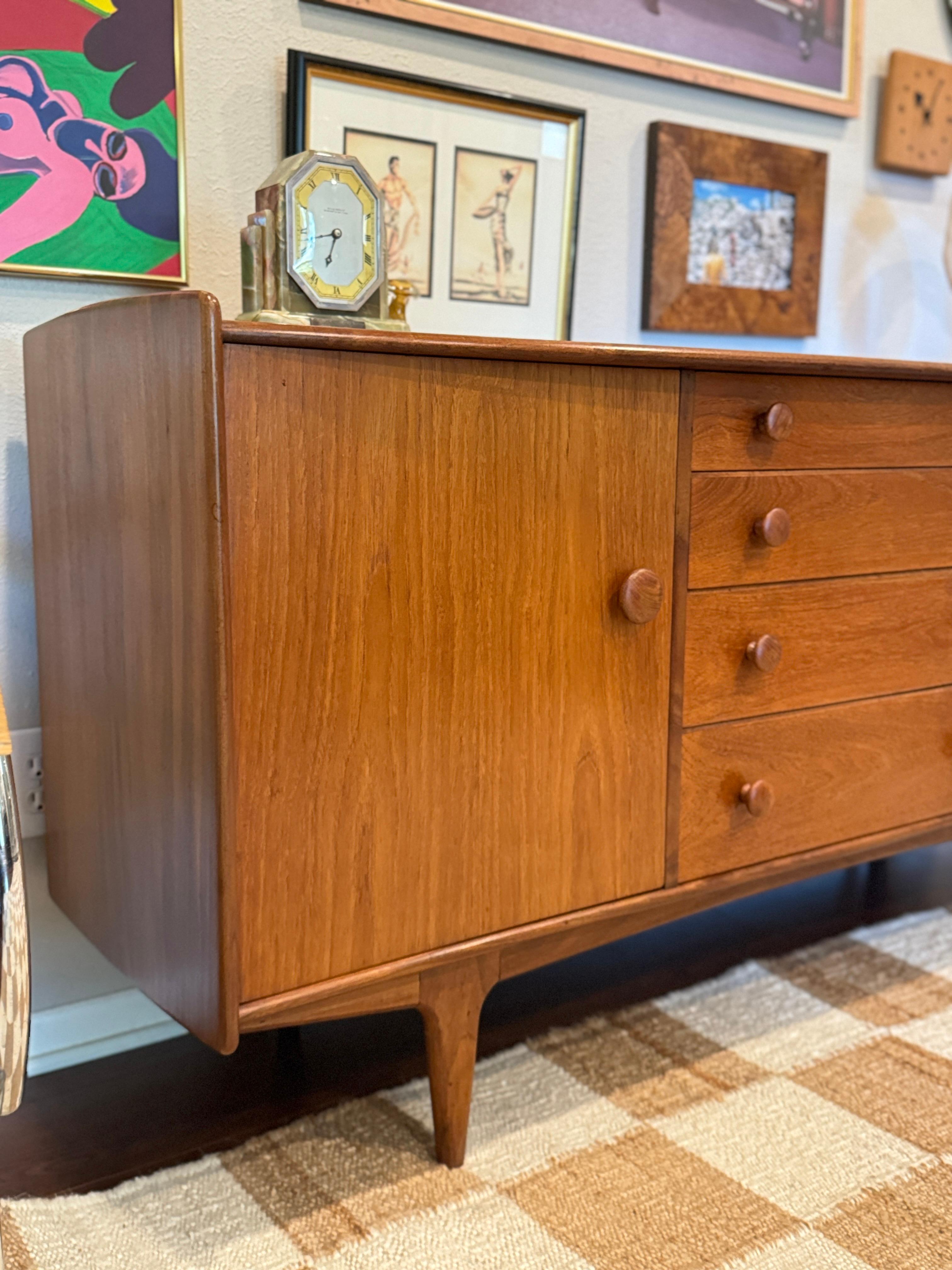 A mid century modern solid teak credenza designed by John Hebert for Younger For Sale 3