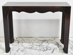 A mid century modern style console with  Oriental inspired details.