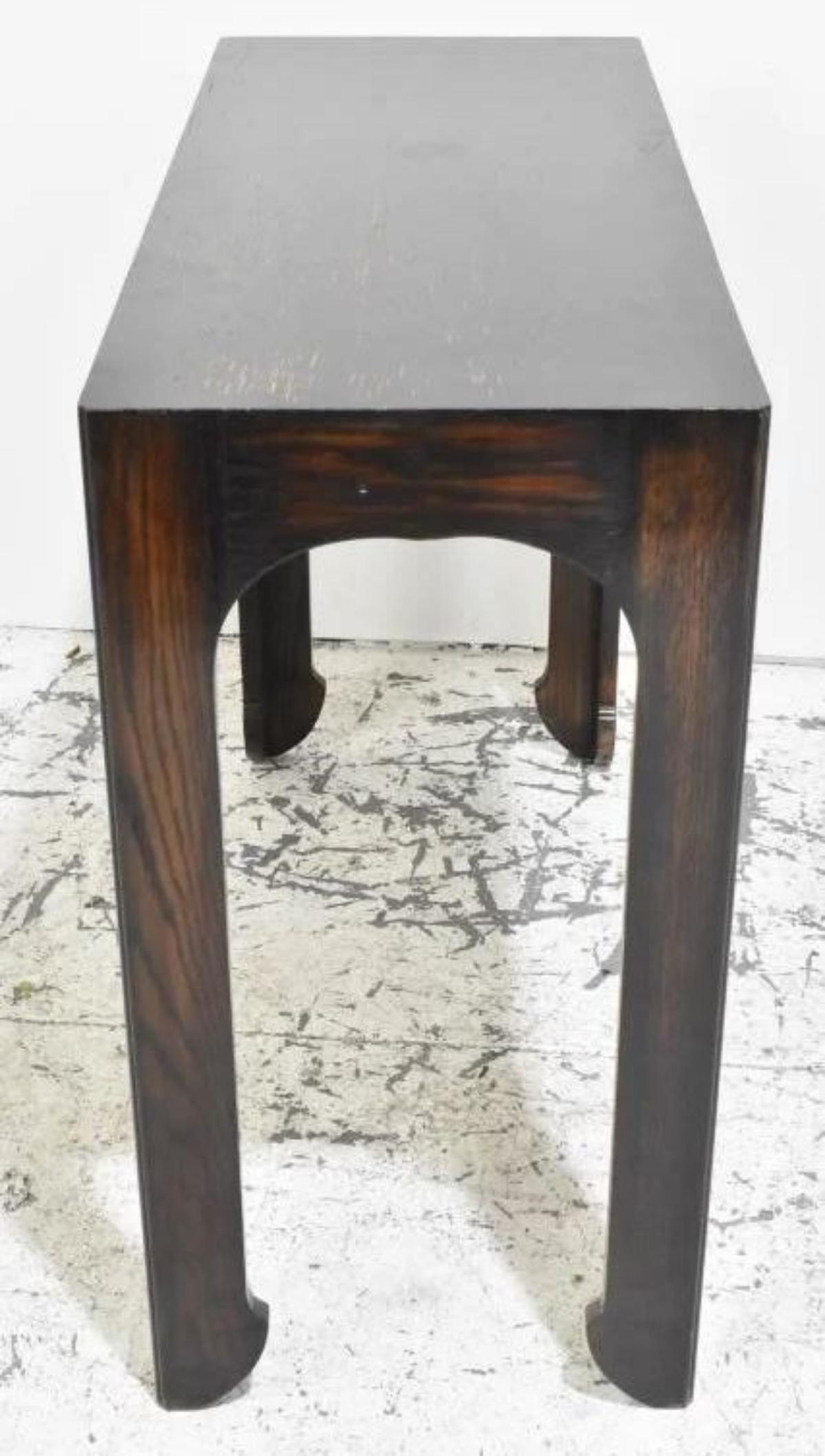 English A mid century modern style console with  Oriental inspired details. For Sale