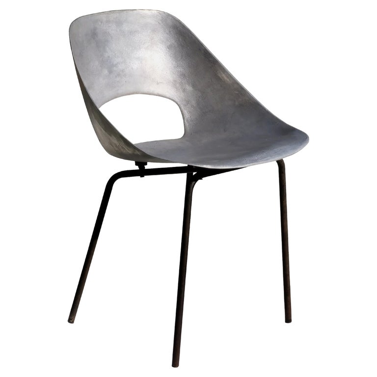 A MID-CENTURY-MODERN "Tonneau" CHAIR by PIERRE GUARICHE, STEINER, France 1950