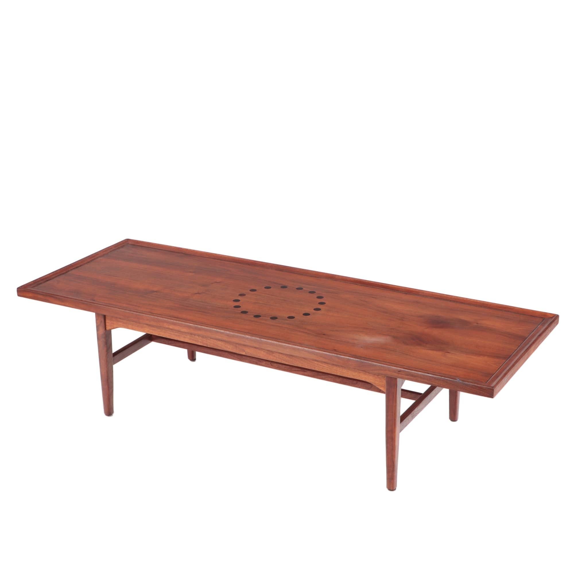 A vintage Mid-Century Modern walnut and Rosewood Drexel Declaration coffee table. Walnut with rosewood inlay.