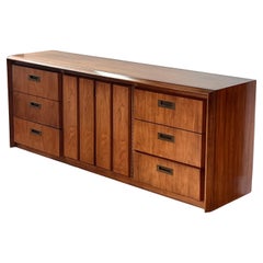 A mid century modern walnut wood nine-door dresser / sideboard, circa 1960