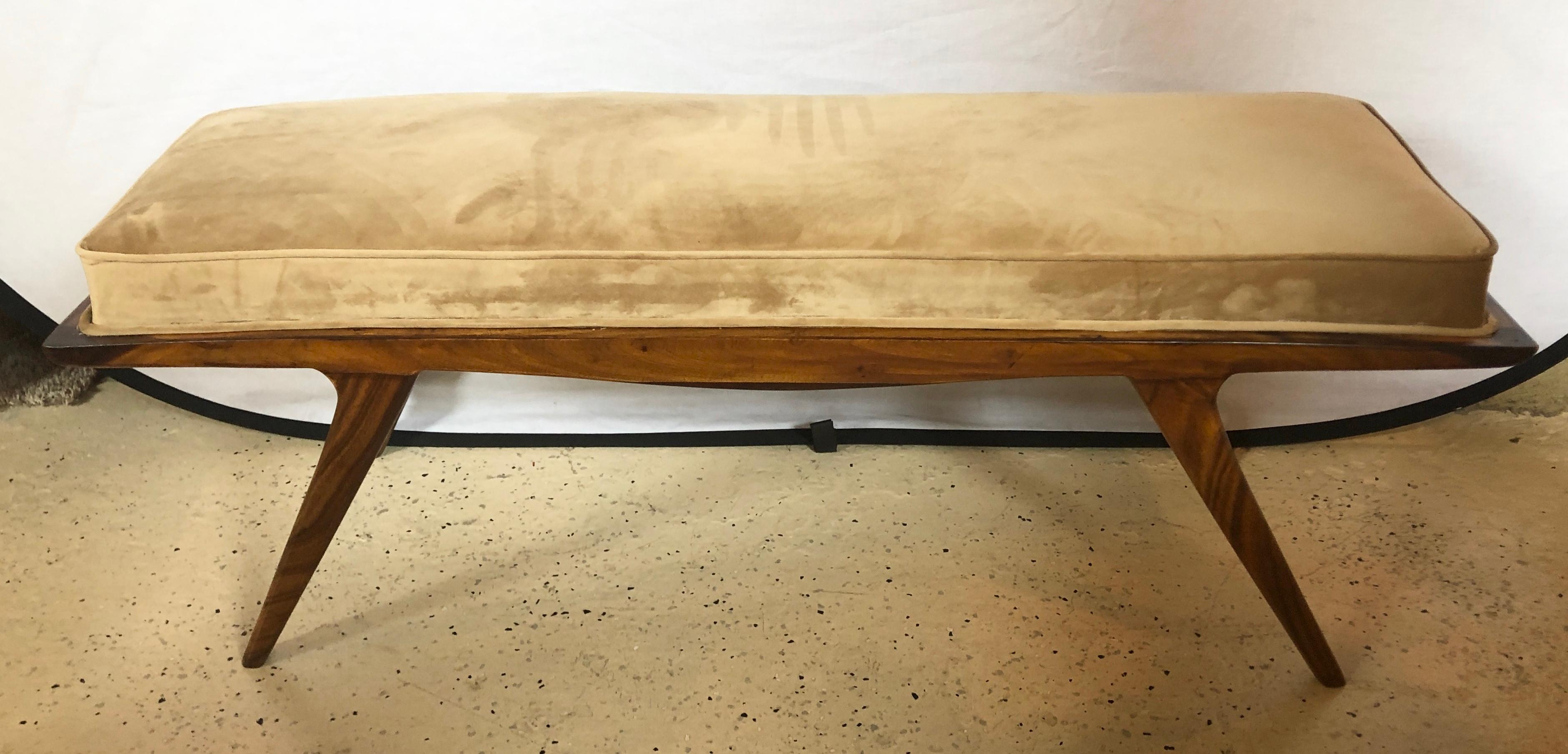 A Mid-Century Modern window bench or footstool in newly upholstered on sprayed legs.