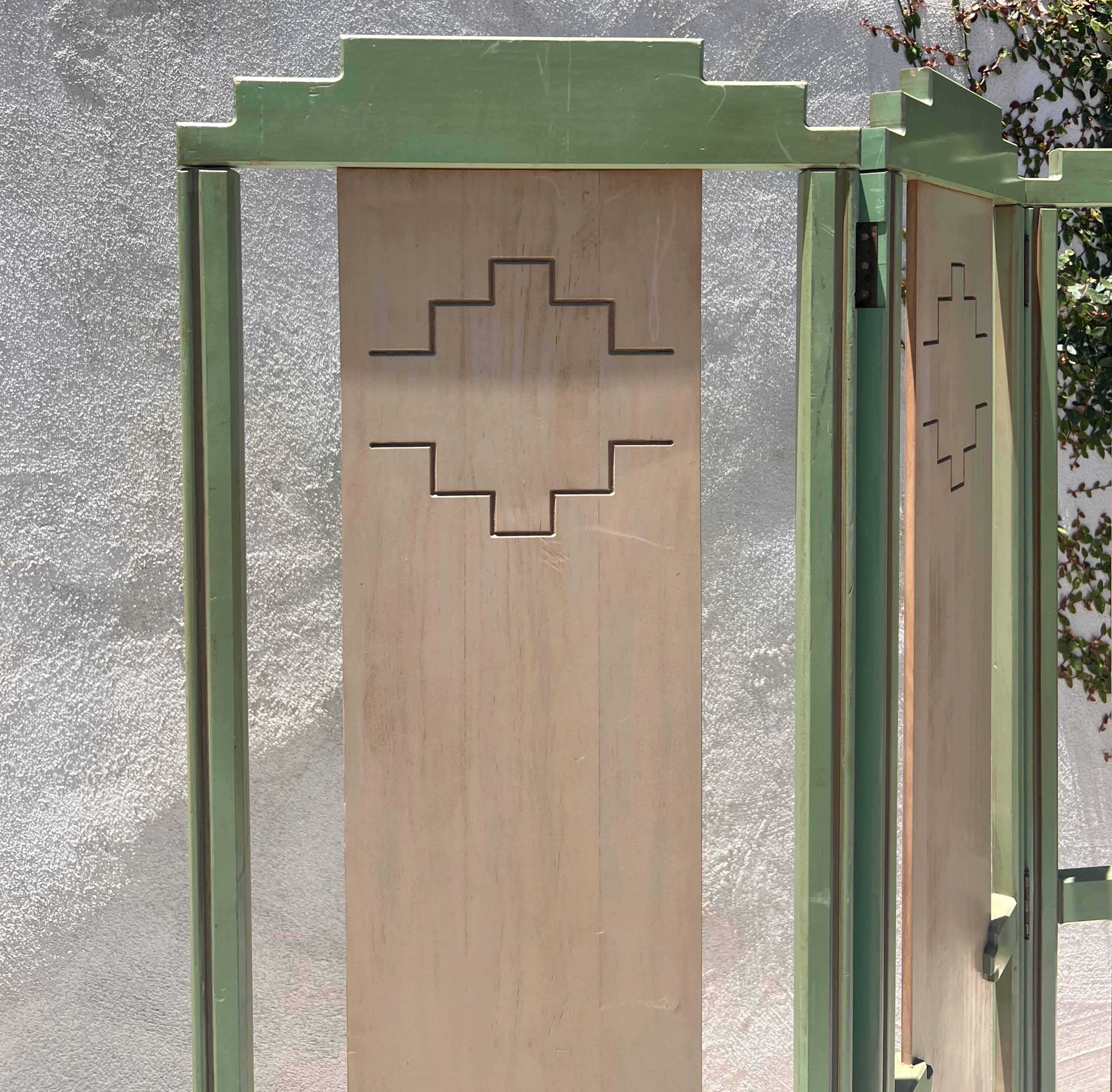 A mid century painted room wood divider in pistachio and cream, circa 1950 3