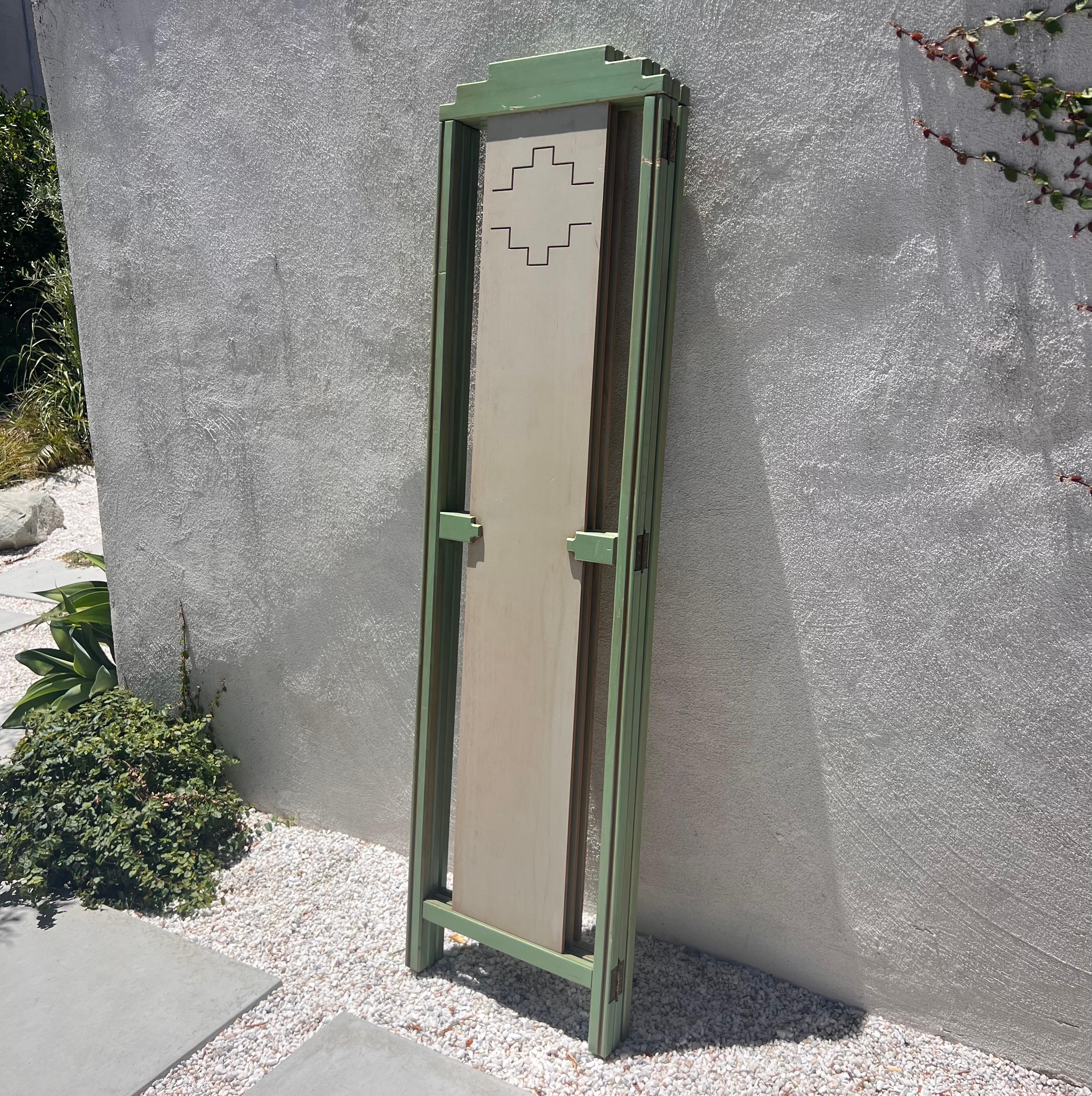 20th Century A mid century painted room wood divider in pistachio and cream, circa 1950