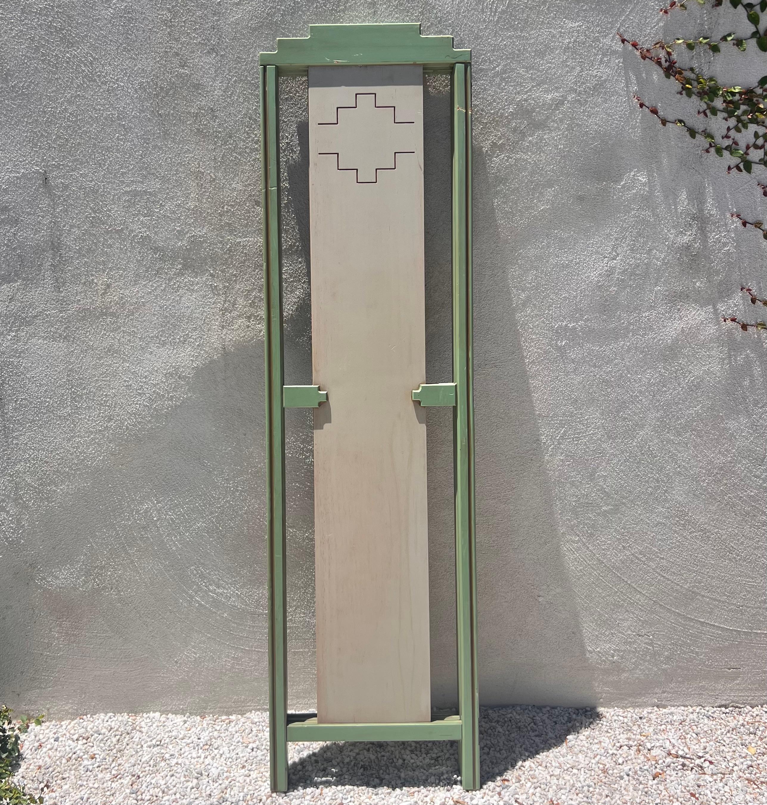 Wood A mid century painted room wood divider in pistachio and cream, circa 1950