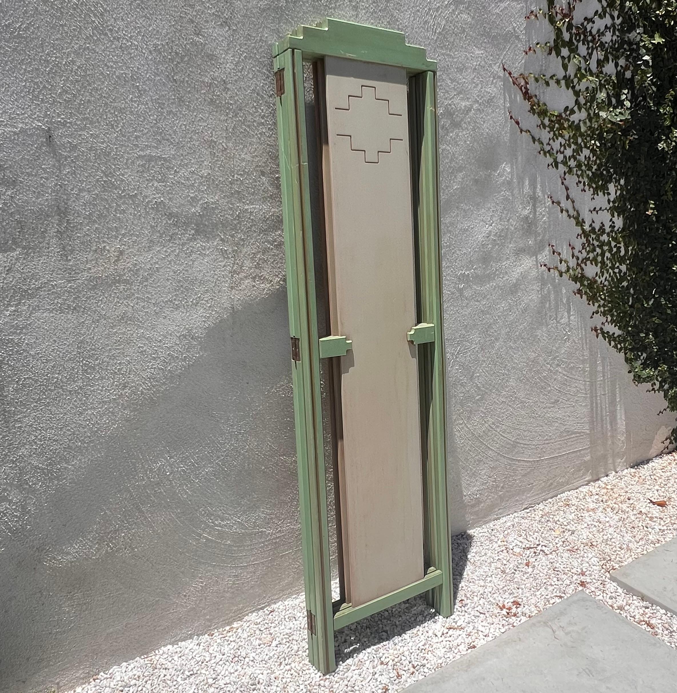 A mid century painted room wood divider in pistachio and cream, circa 1950 1