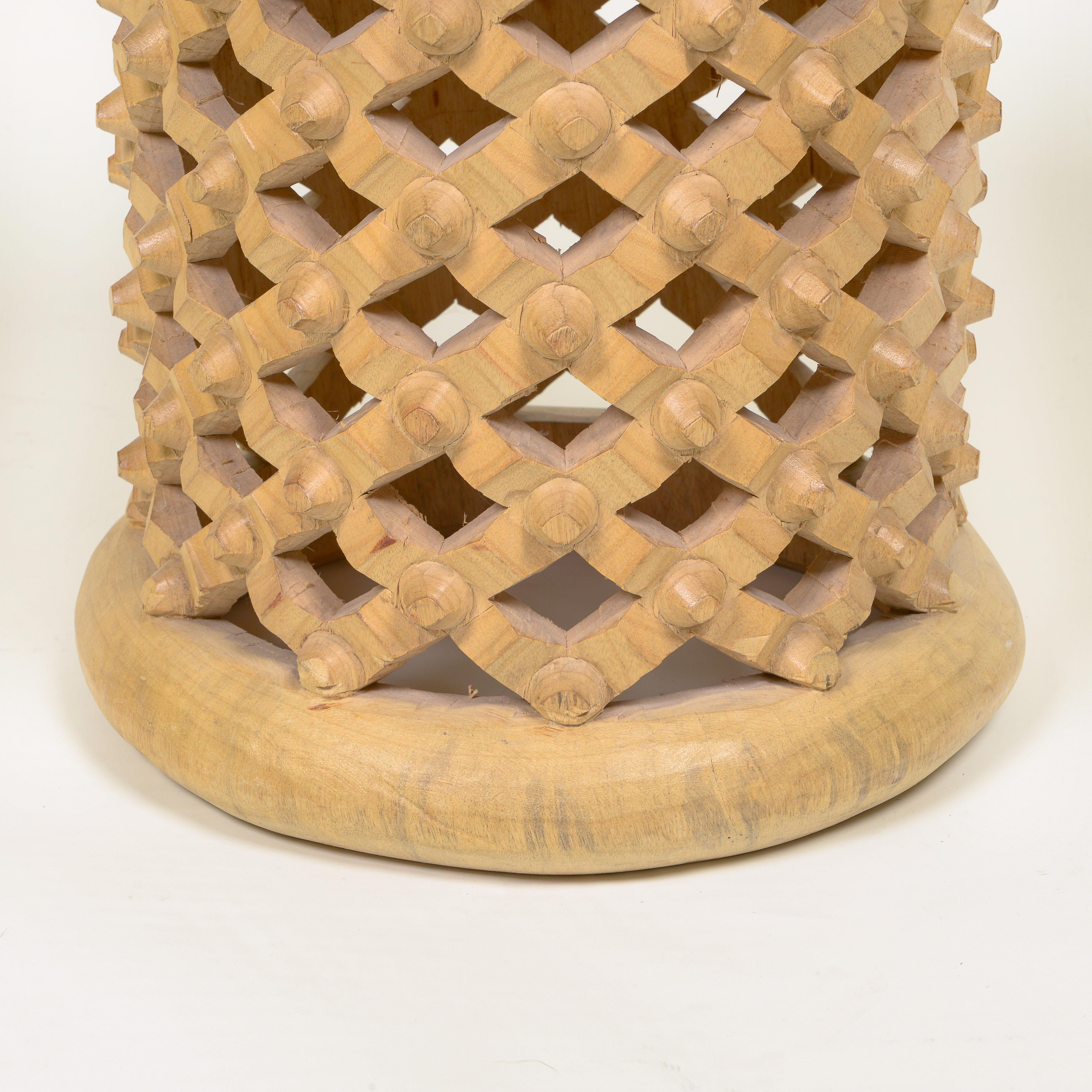 A Mid-Century Raw Bamileke Wood Side Table In Excellent Condition For Sale In New York, NY