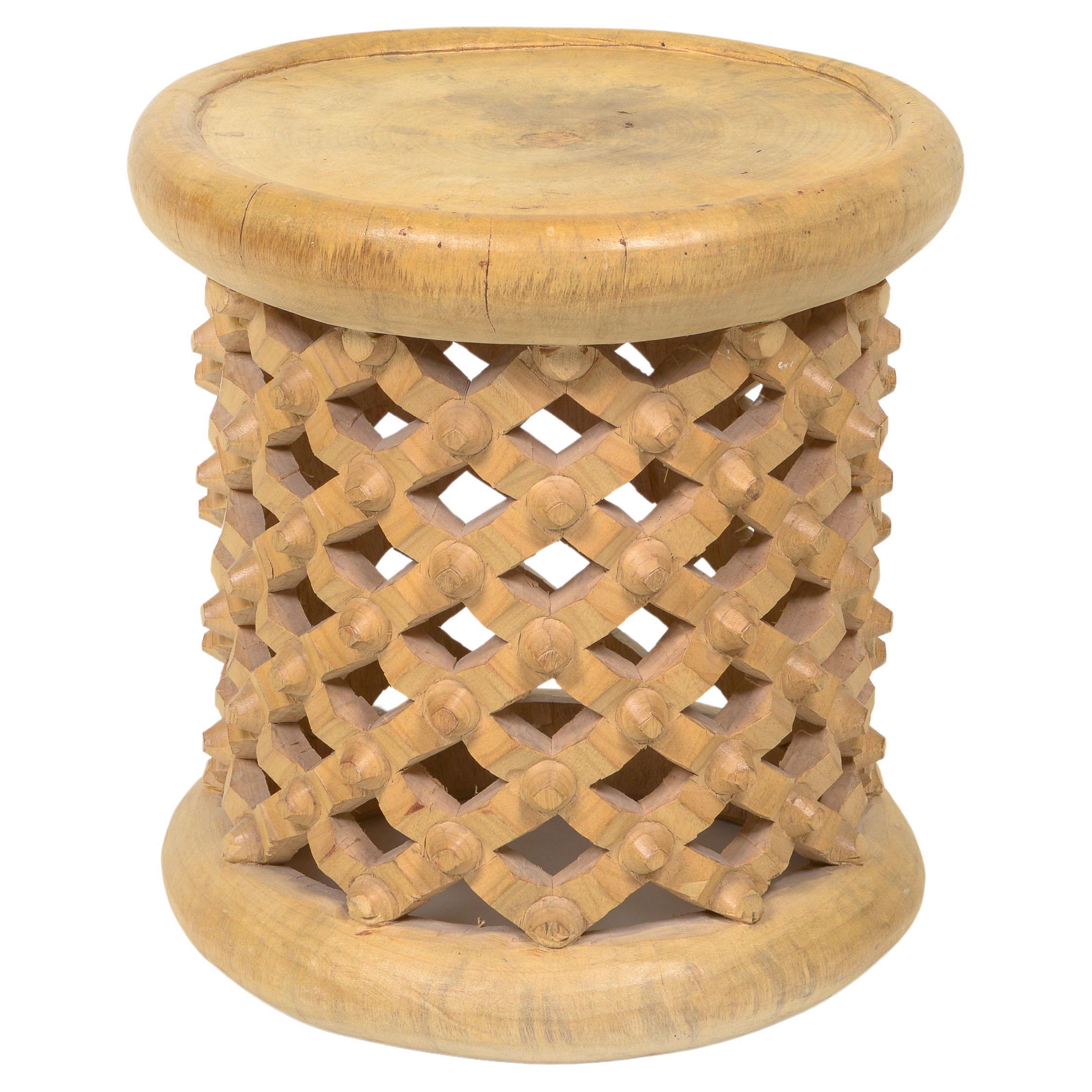 A Mid-Century Raw Bamileke Wood Side Table For Sale