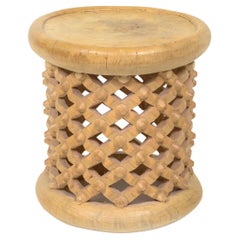 A Mid-Century Raw Bamileke Wood Side Table