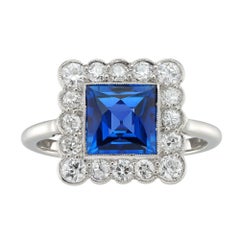 A mid-century sapphire and diamond square cluster ring