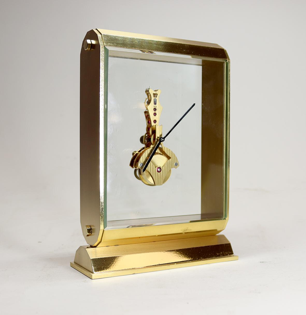 Brass A Mid-Century Swiss Inline Skeleton Timepiece For Sale