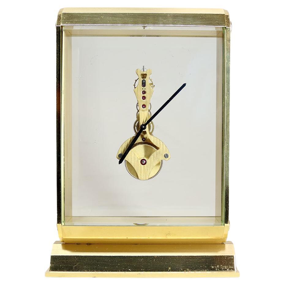 A Mid-Century Swiss Inline Skeleton Timepiece For Sale