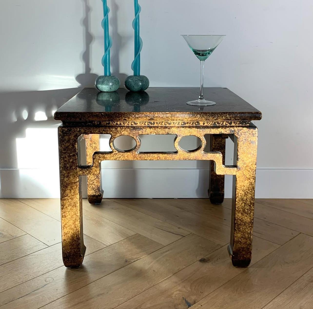 A vintage mid century modern late 1960s / early 1970s tortoise-shell lacquer finish accent table by Henredon with exquisite Silk Road-esque geometry. See maker’s mark for authenticity on verso of table top. Some scratches and scuffs that are visible