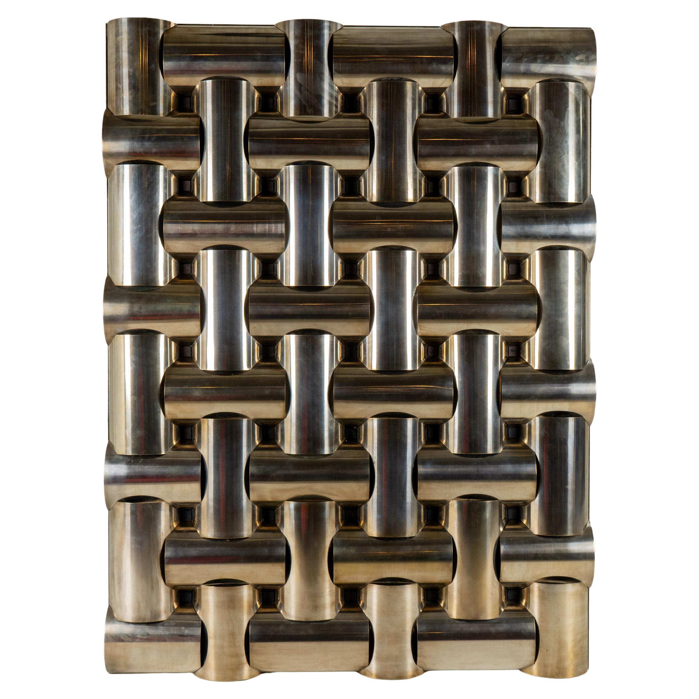 A Mid-Century Wall Sculpture From Interlocking Metal Tubing For Sale