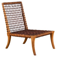 A Mid-Century Woven Leather Lounge Chair by T. H. Robsjohn-Gibbings