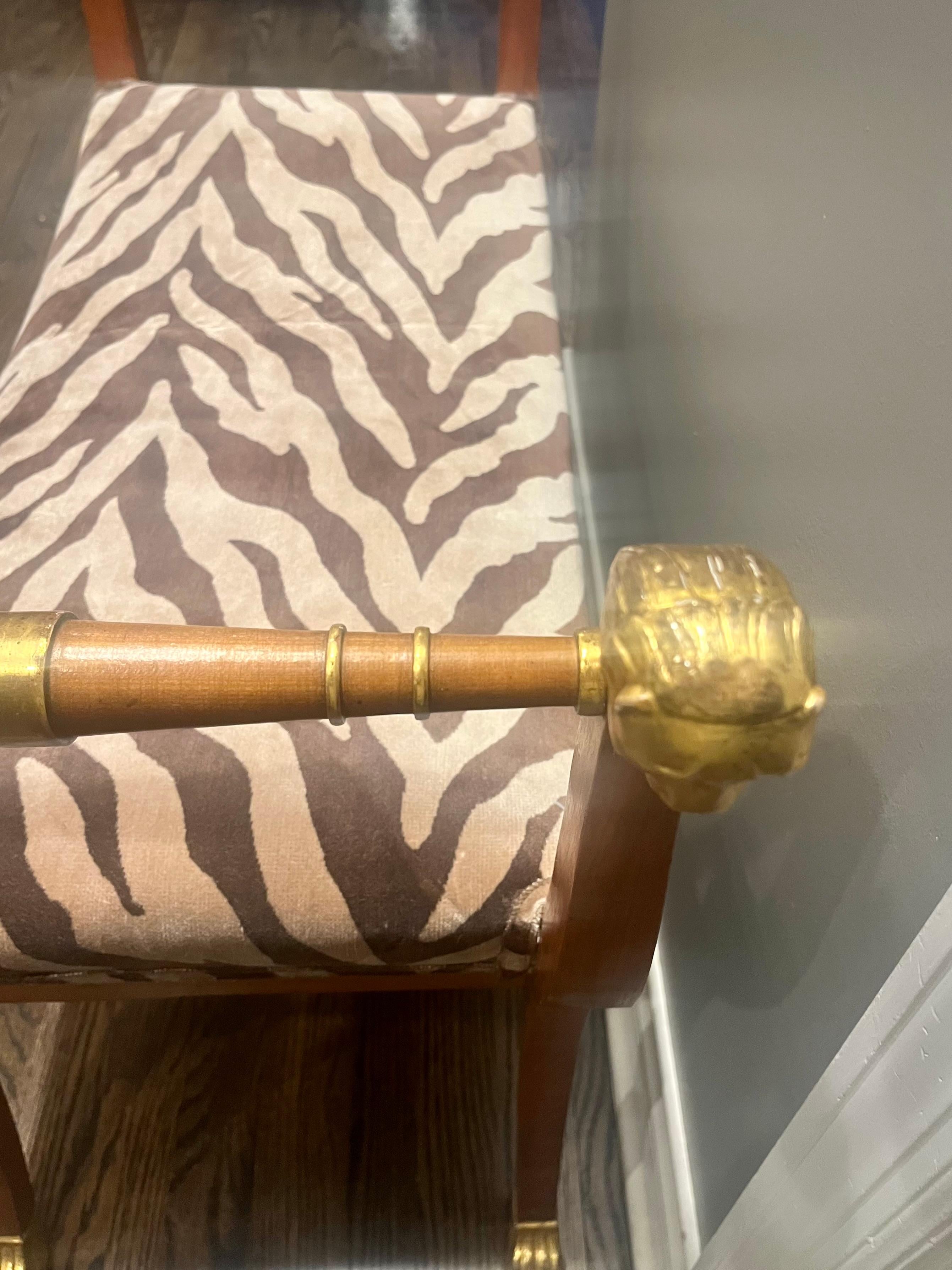 italien A Mid Twentieth Century Empire style parcel gilt bench by Baker Furniture Co. en vente