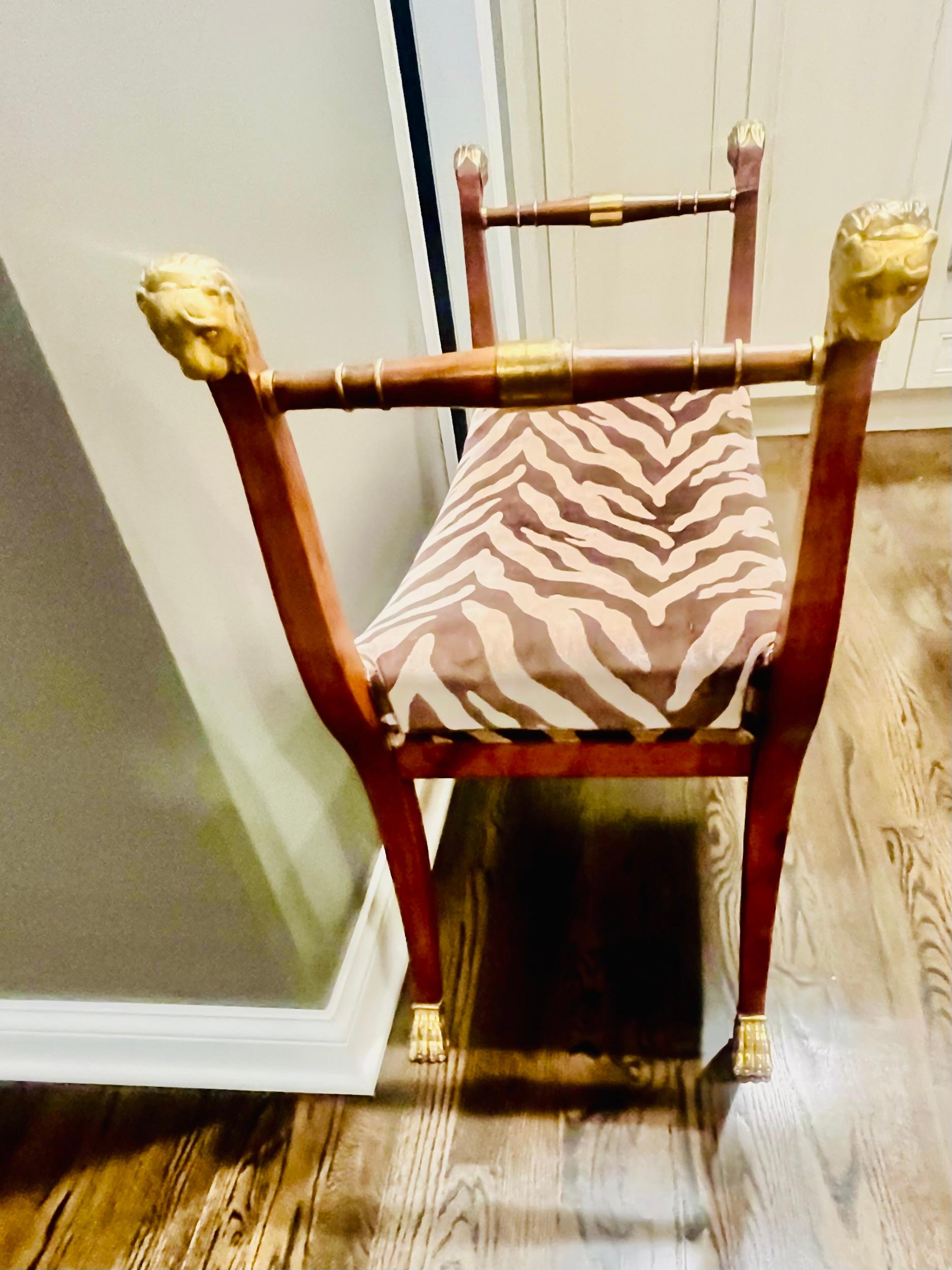 20ième siècle A Mid Twentieth Century Empire style parcel gilt bench by Baker Furniture Co. en vente