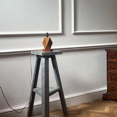 A mid twentieth century oak brutalist table lamp