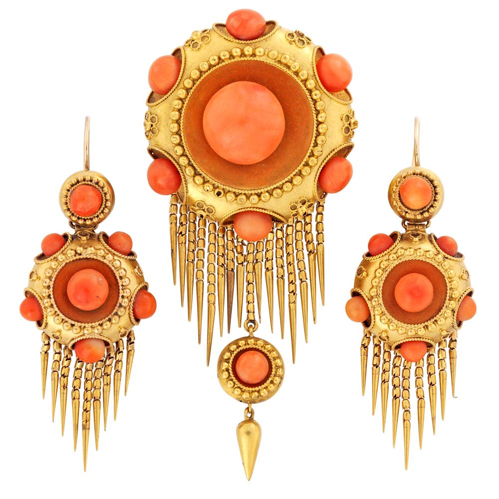 A mid-Victorian coral fringe suite, consisting of a necklace, a bangle, a pair of earrings and a brooch, all set with coral beads in a cluster design within a yellow gold rope design border, with coral bead surround in a yellow gold mount with