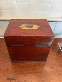 A mid Victorian Mahogany Travelling Dressing Case or Medicine Chest by Thomson