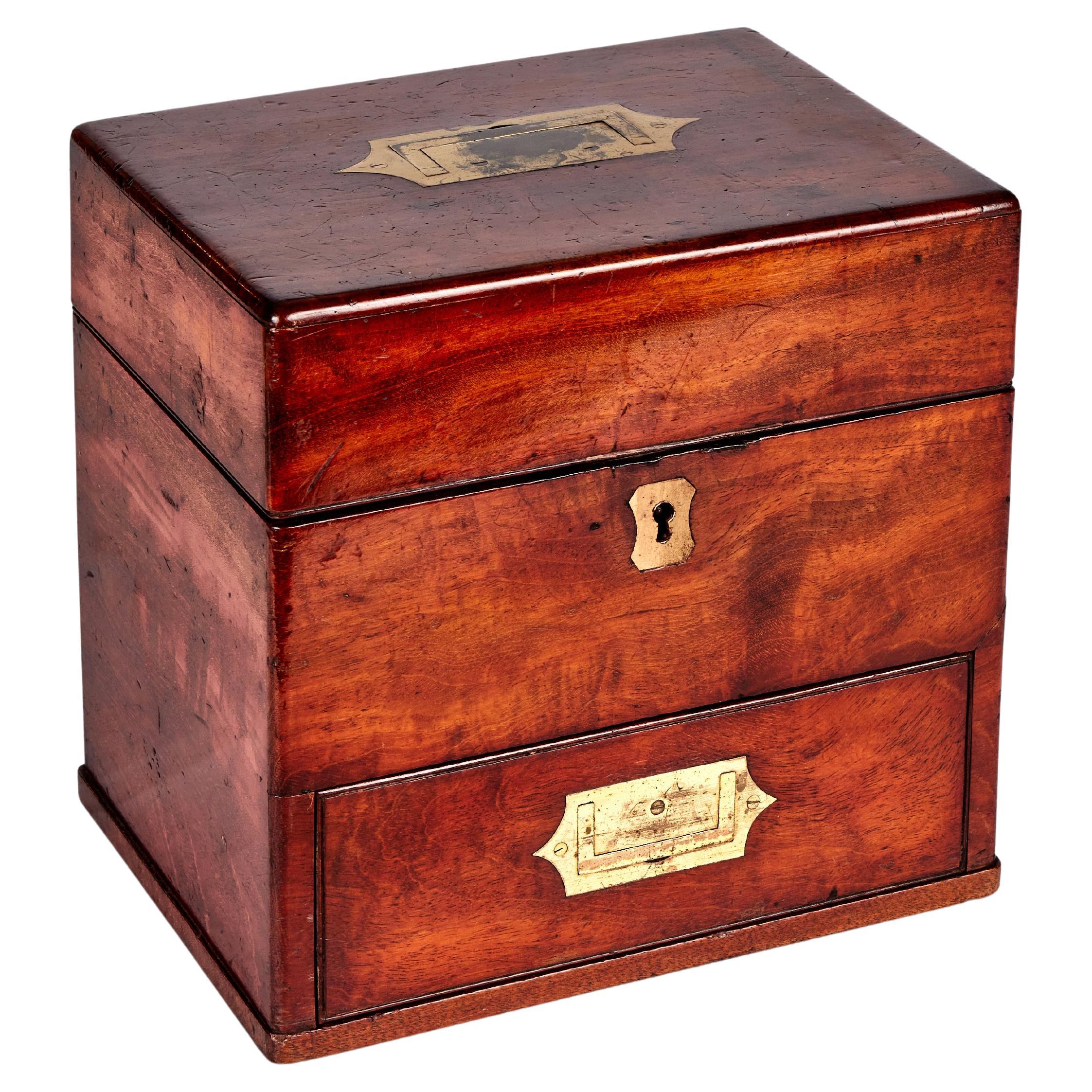 A mid Victorian Mahogany Travelling Dressing Case or Medicine Chest by Thomson