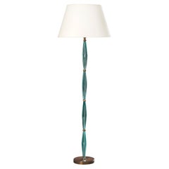 A Midcentury Segmented Glass Standard Lamp