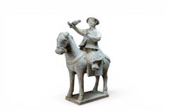 Une figurine équestre de la dynastie Ming représentant un cheval et un oiseau