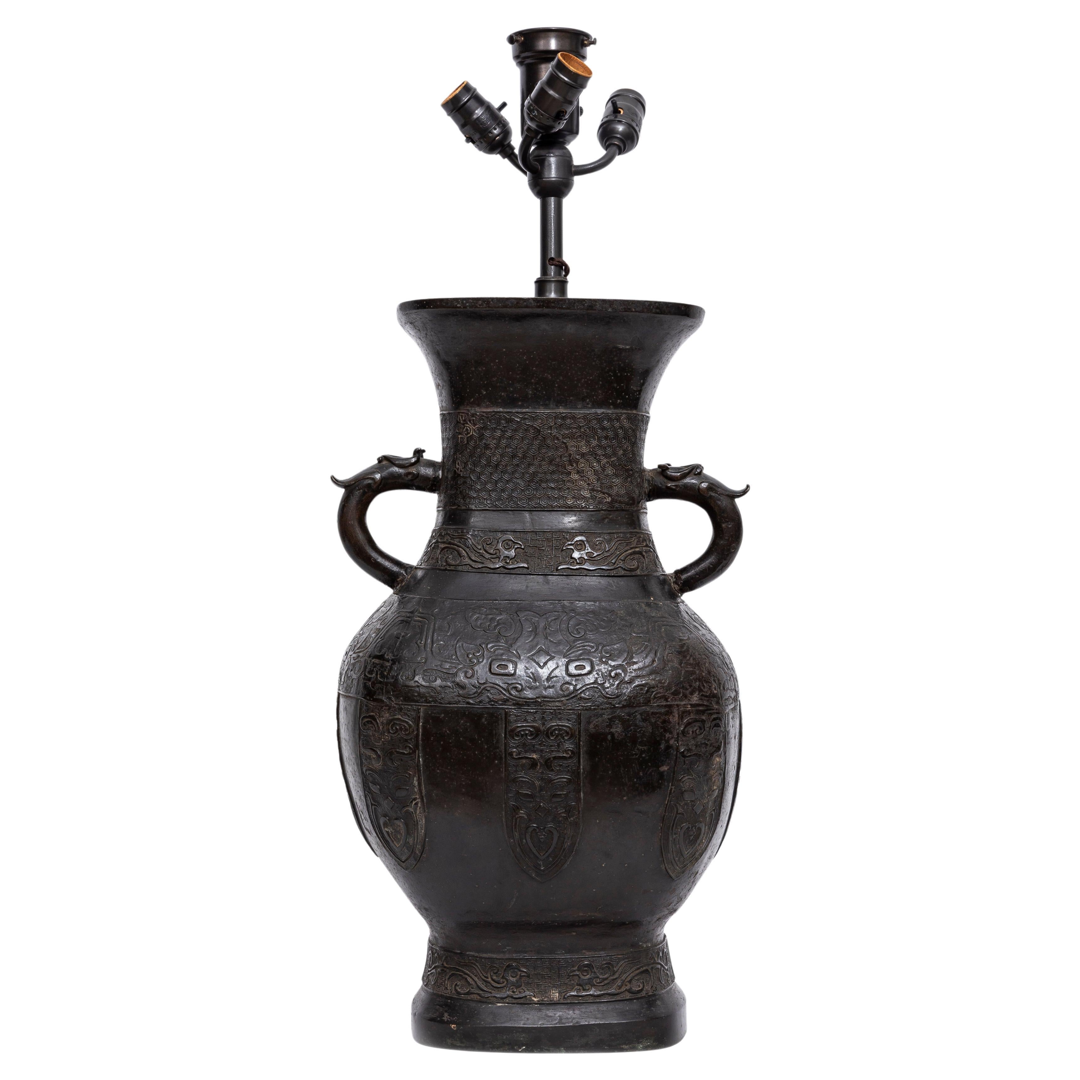 A Ming Dynasty Patinated Bronze Relief Work Vase Turned to a Lamp For Sale 1