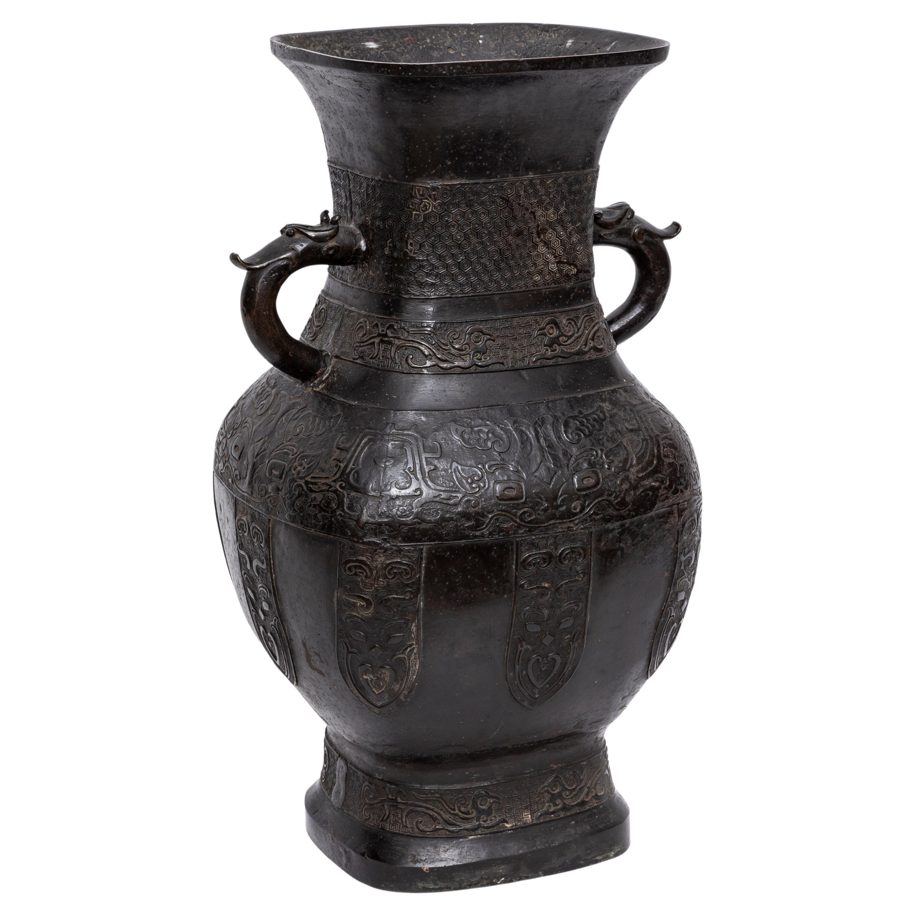 A Ming Dynasty Patinated Bronze Relief Work Vase Turned to a Lamp For Sale