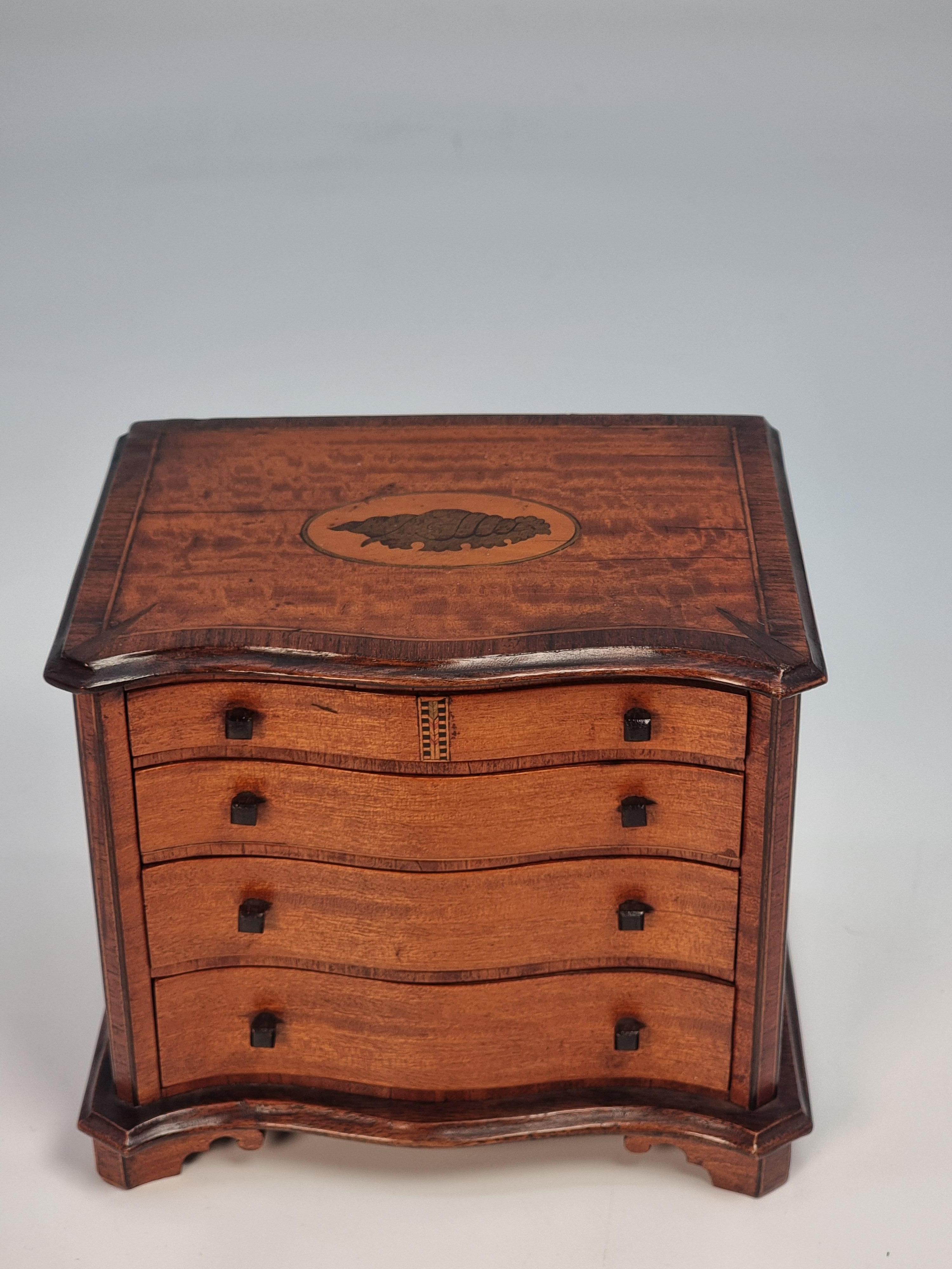 Georgian A miniature 18th C style mahogany English serpentine chest of drawers 1907 For Sale
