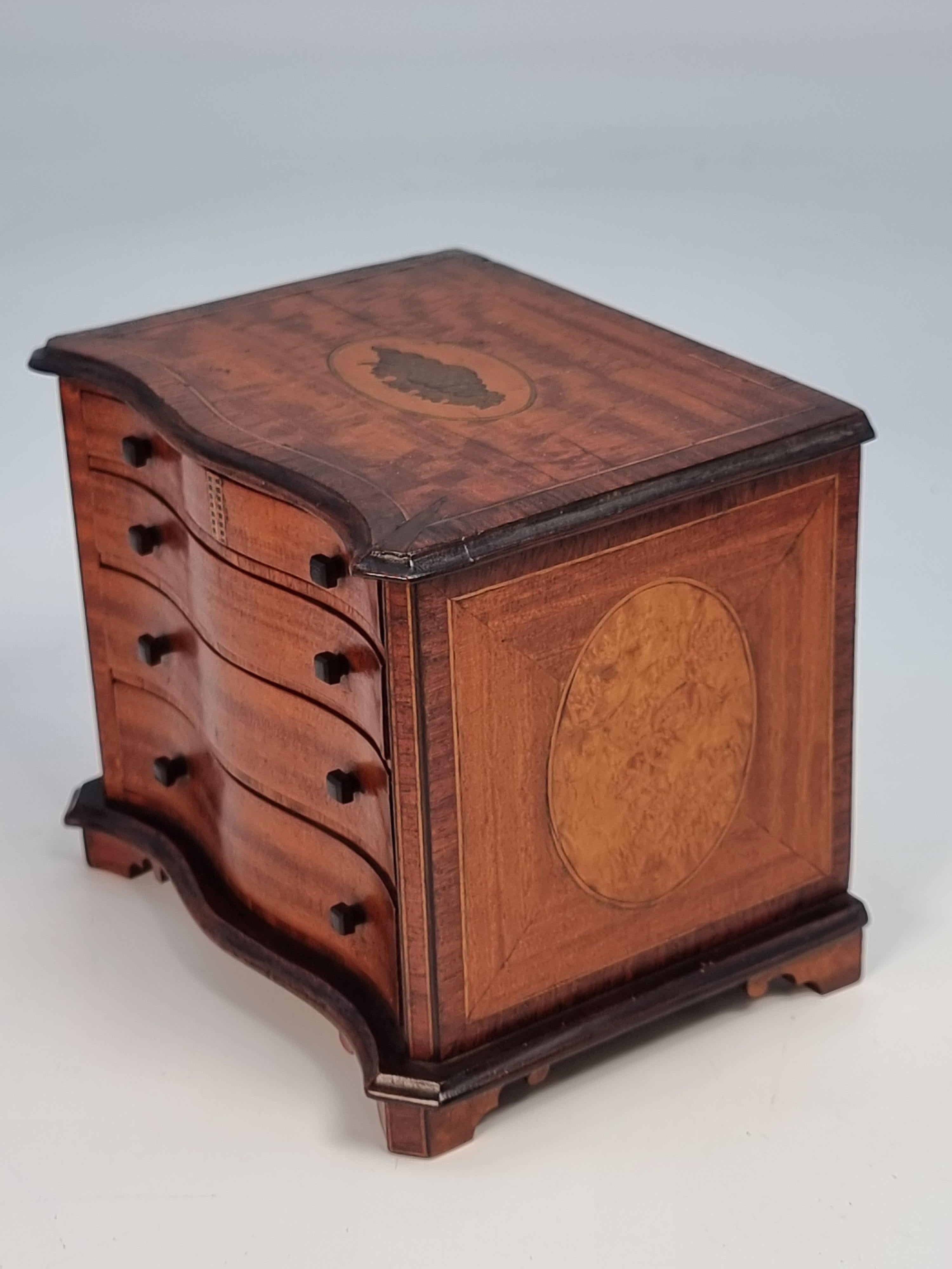 British A miniature 18th C style mahogany English serpentine chest of drawers 1907 For Sale