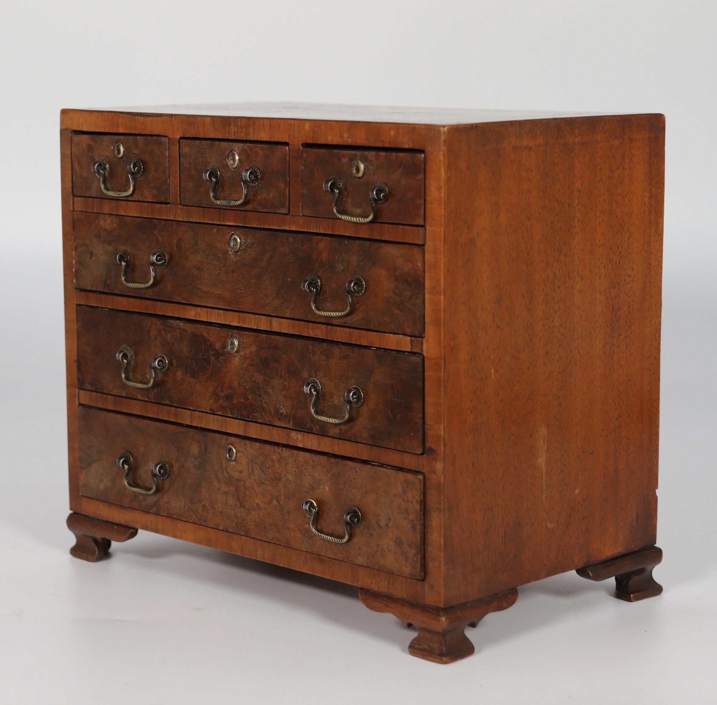A miniature George II style figured walnut chest of drawers, English circa 1900 For Sale 5